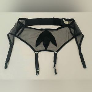 Vintage garter belt by Olga Size 28-30 in.